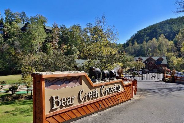 Bear Creek crossing entrance sign at Rocky Top Memories, a 2 bedroom cabin rental located in Pigeon Forge